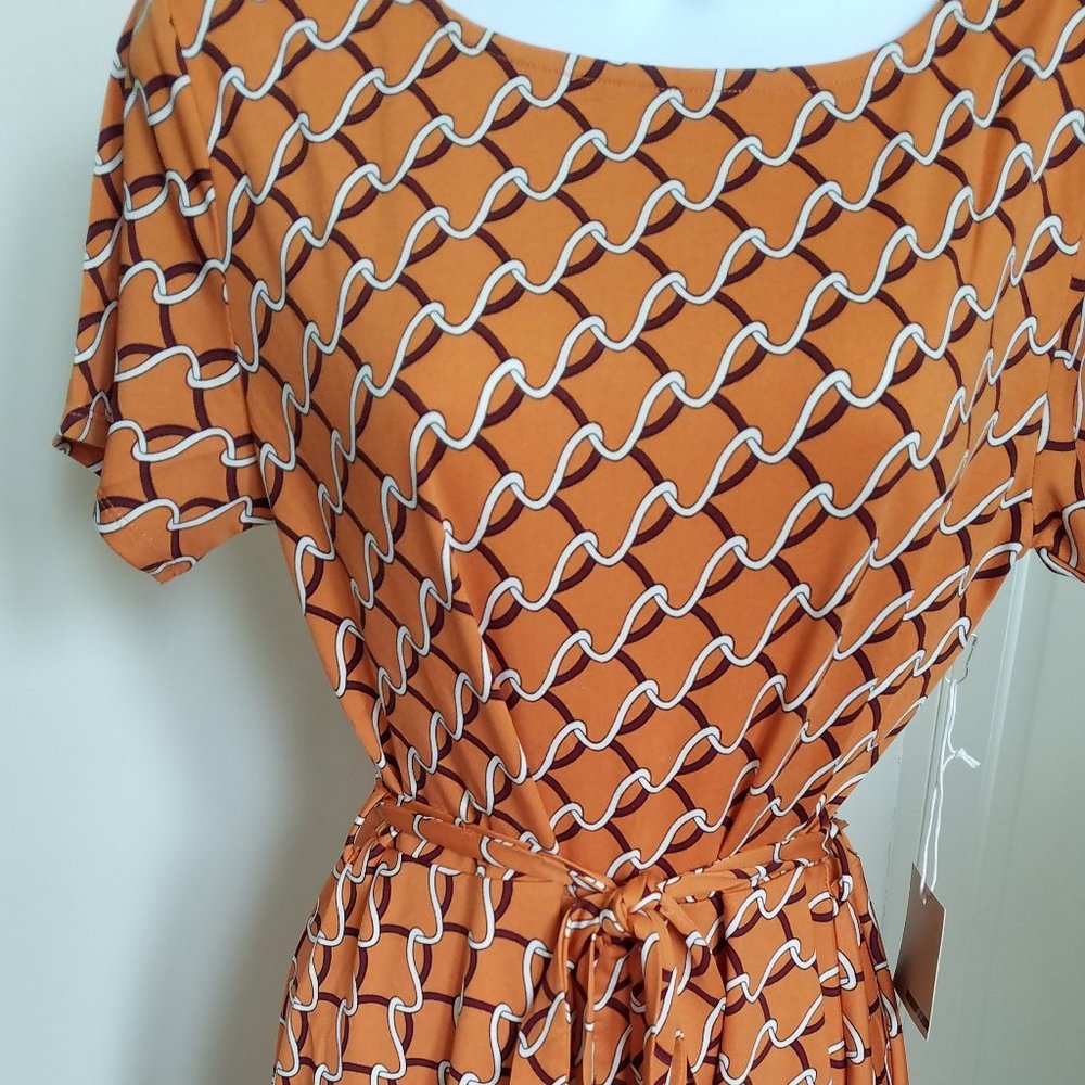 Peplum top with belt